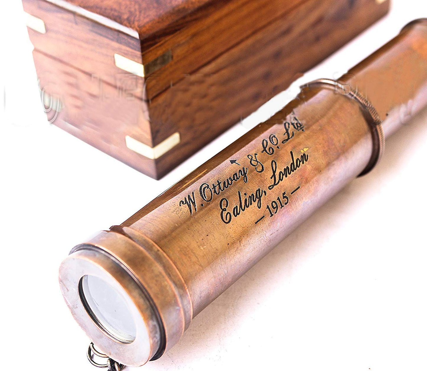 Handcrafted wooden storage box with a brass anchor inlay open with the telescope inside.
