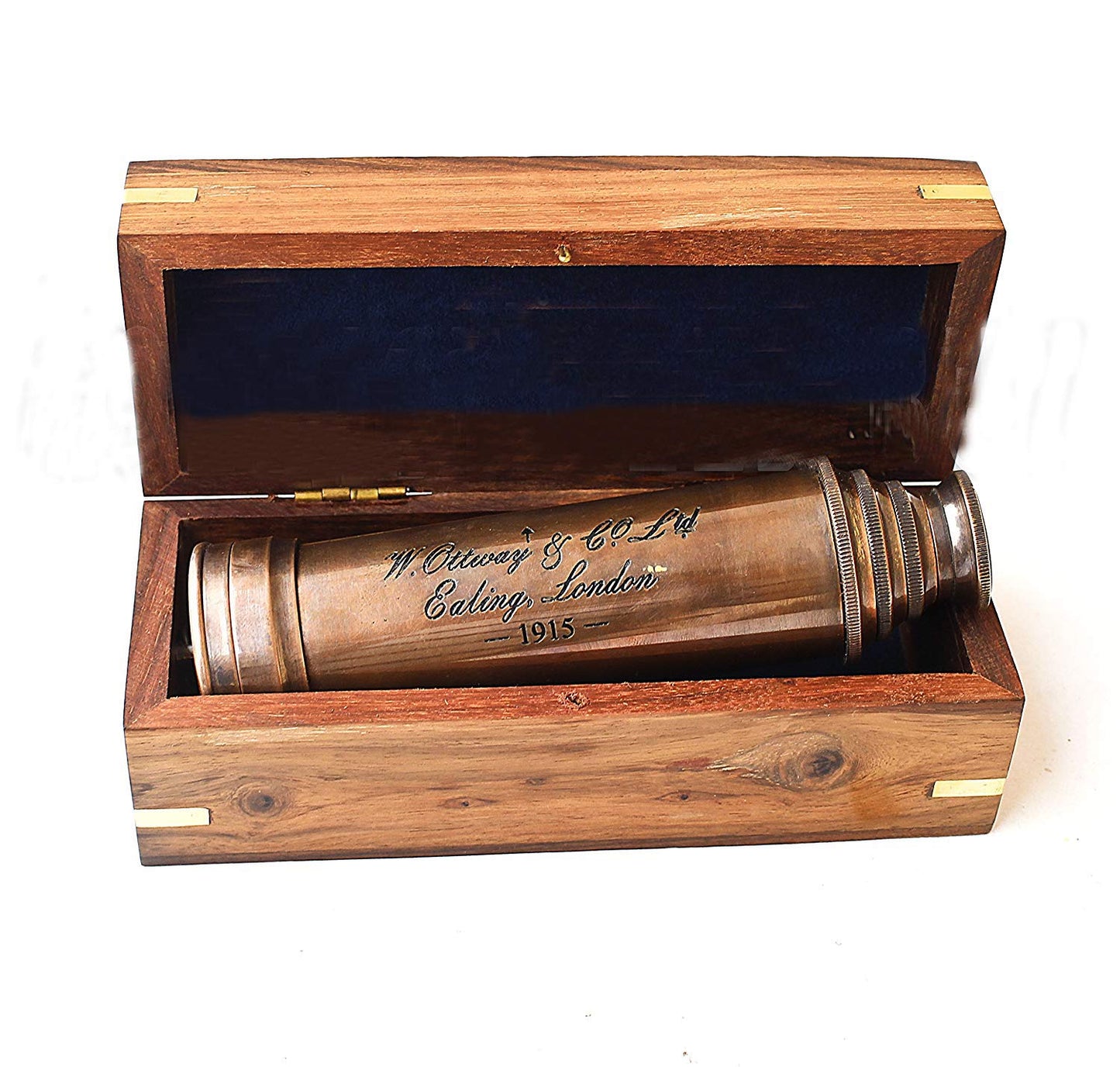 Side angle view of the collapsed 7 inch vintage copper telescope resting beside its gift box.