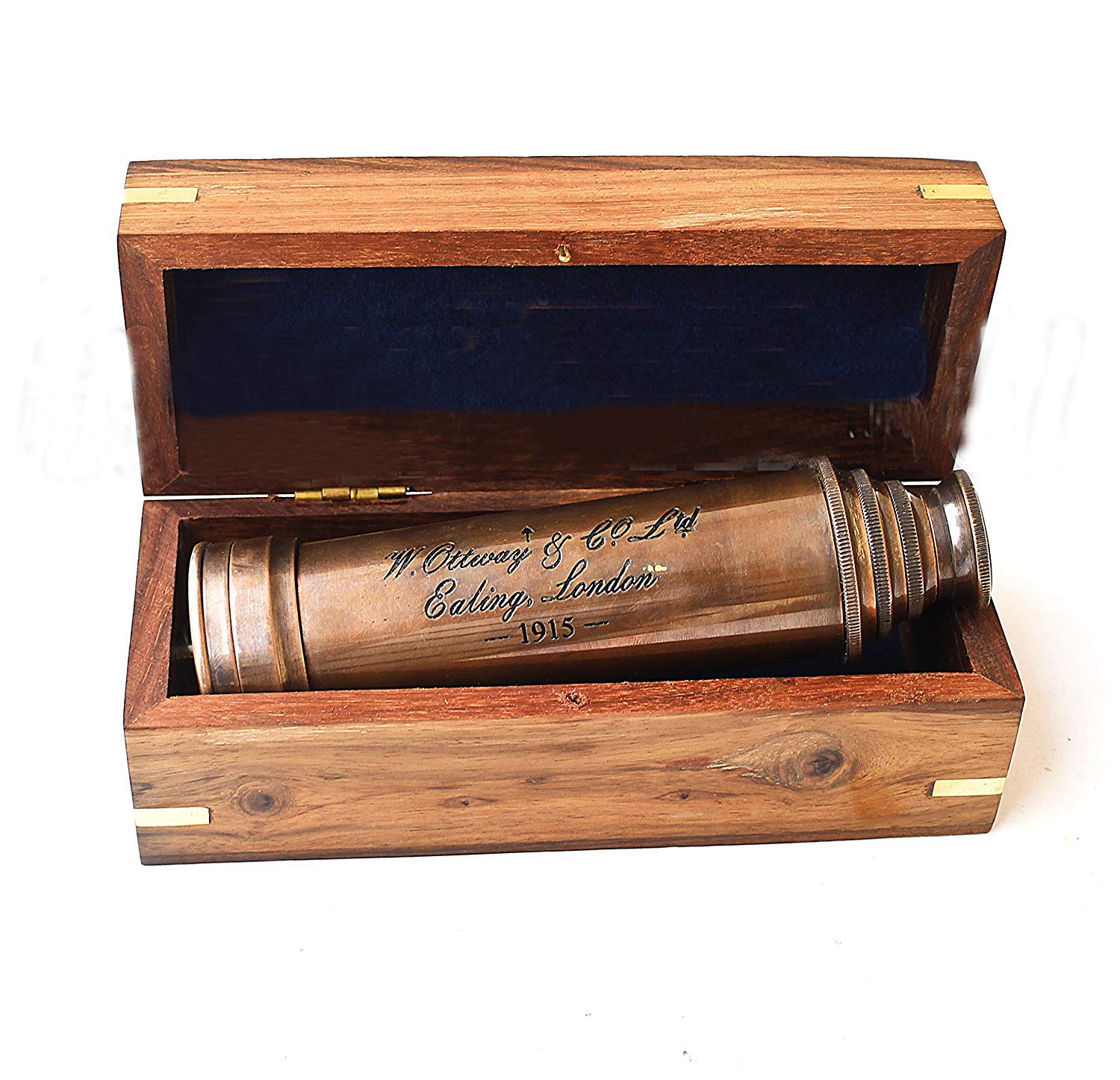 Side angle view of the collapsed 7 inch vintage copper telescope resting beside its gift box.