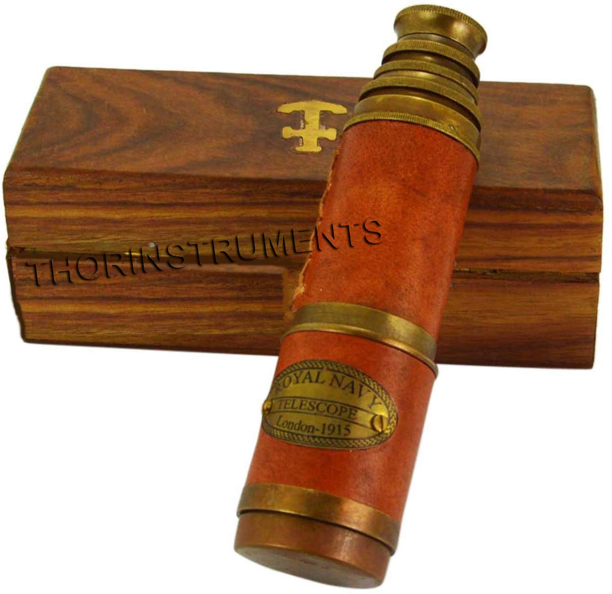 Victorian style brass spyglass fully extended with pink leather wrapping details