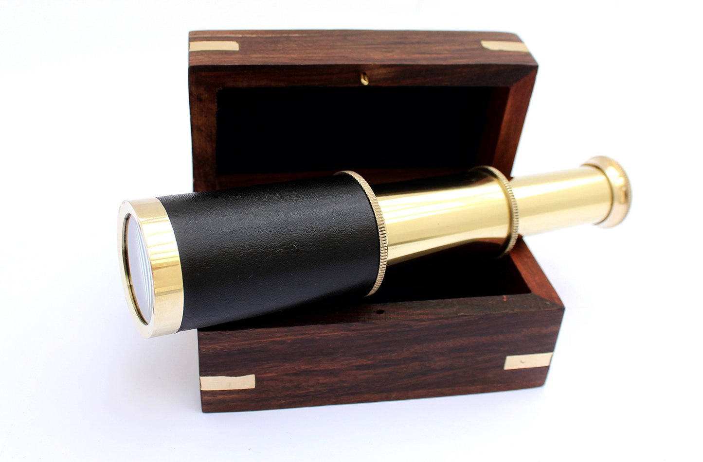 Close up of the intricate brass anchor design on the top lid of the wooden decorative box