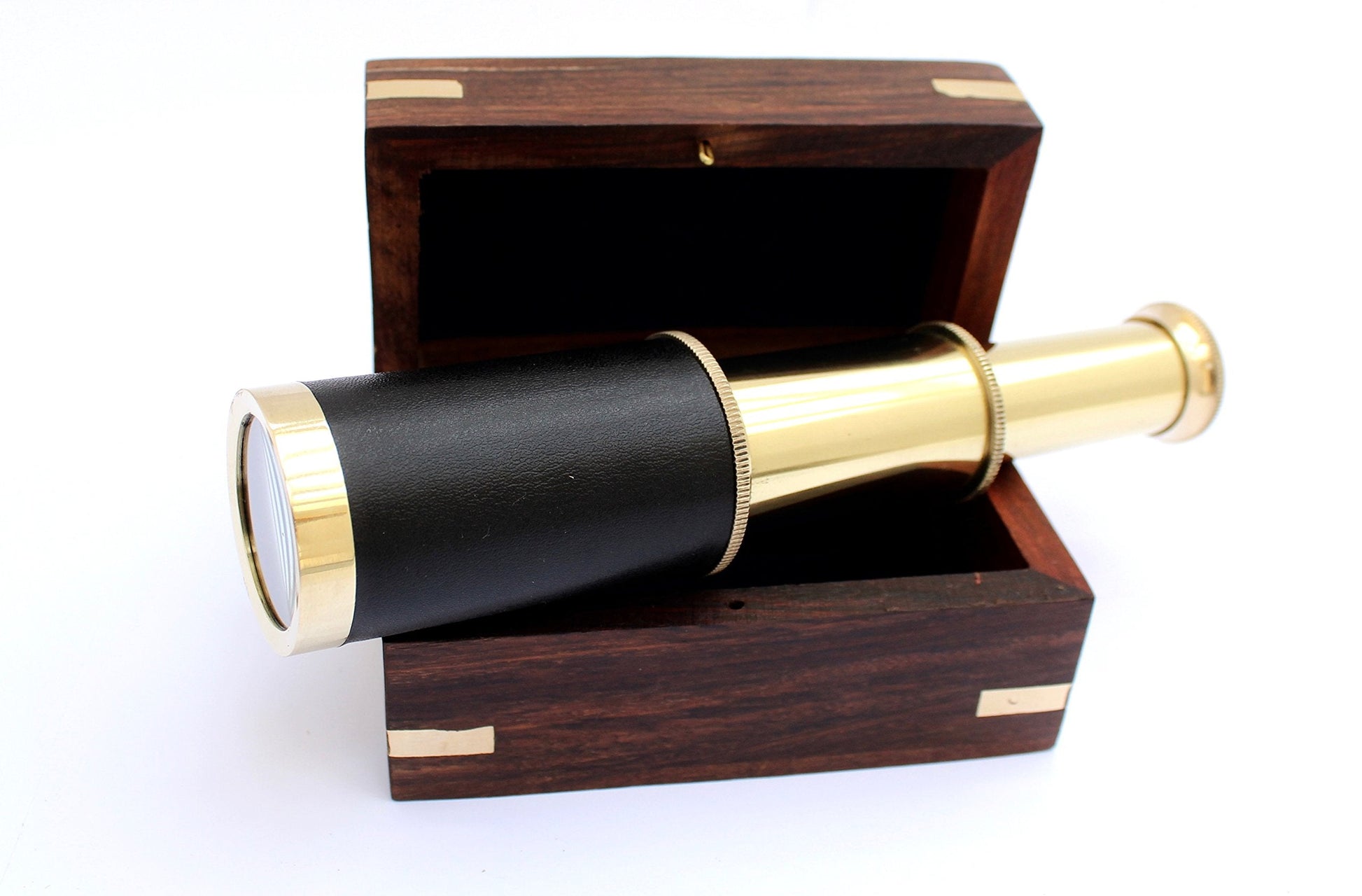 Close up of the intricate brass anchor design on the top lid of the wooden decorative box