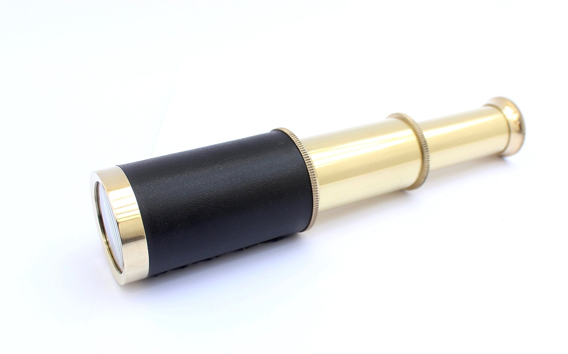 Thor Instruments pocket spyglass collapsed into its compact size alongside the open display box