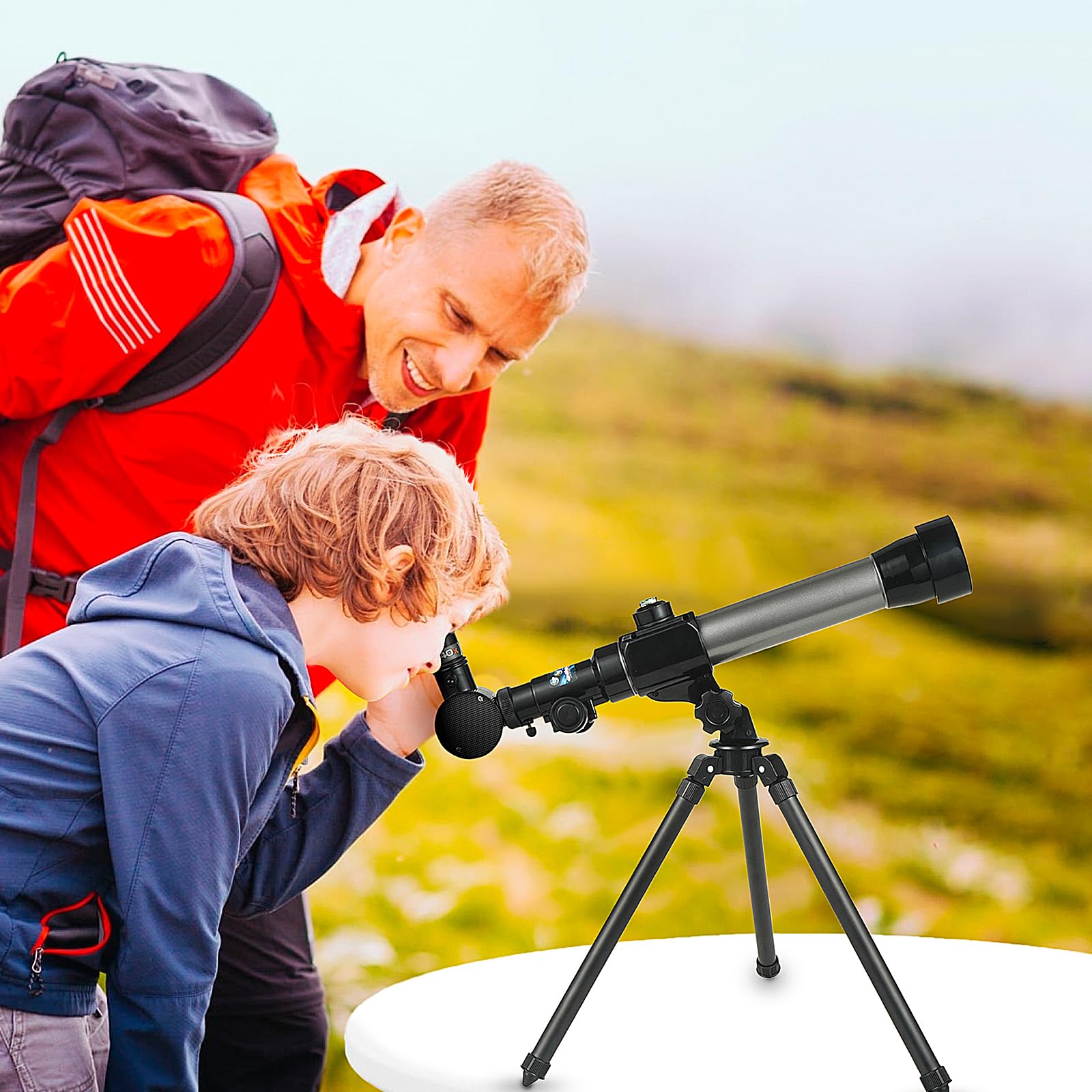 Black educational spyglass telescope set with twenty times thirty times and forty times magnification interchangeable eyepieces.