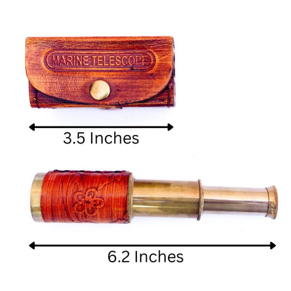 Close up view of the intricate embossed leather wrap on the solid brass nautical telescope body.