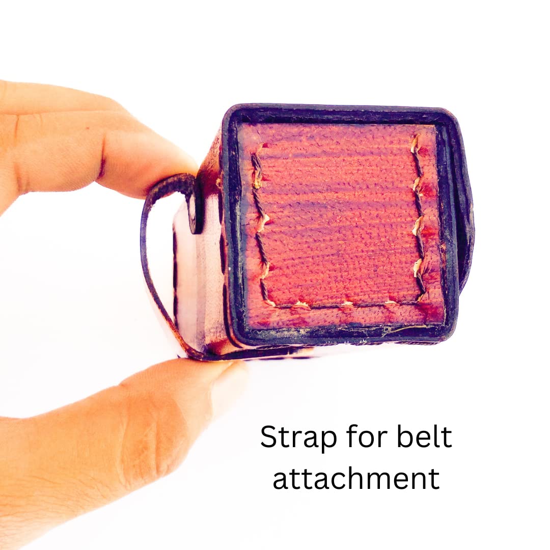 Six inch miniature marine spyglass toy telescope being adjusted for focus by hand.