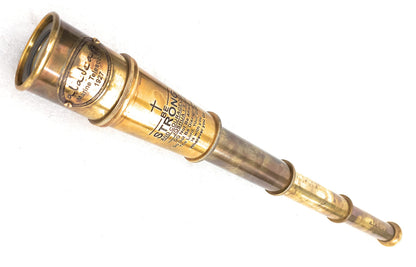 Aladean 16 inch antique brass maritime replica collapsed next to its hand stitched leather case.