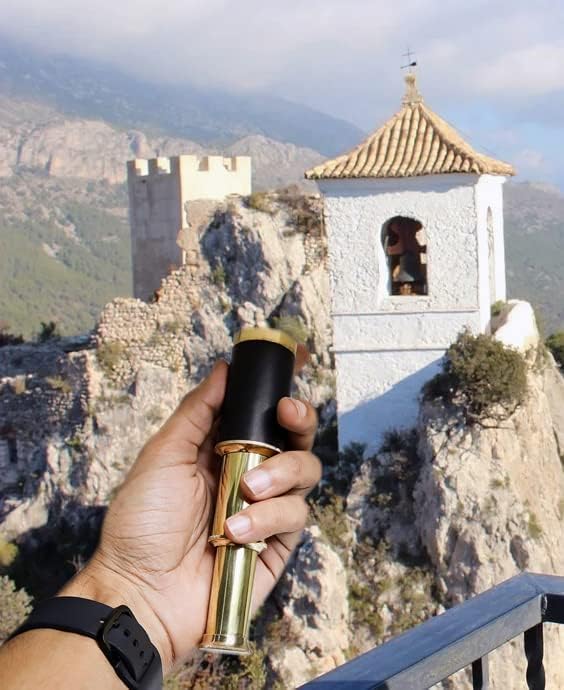 Premium glass optics eyepiece close up view on a classic adventure spyglass