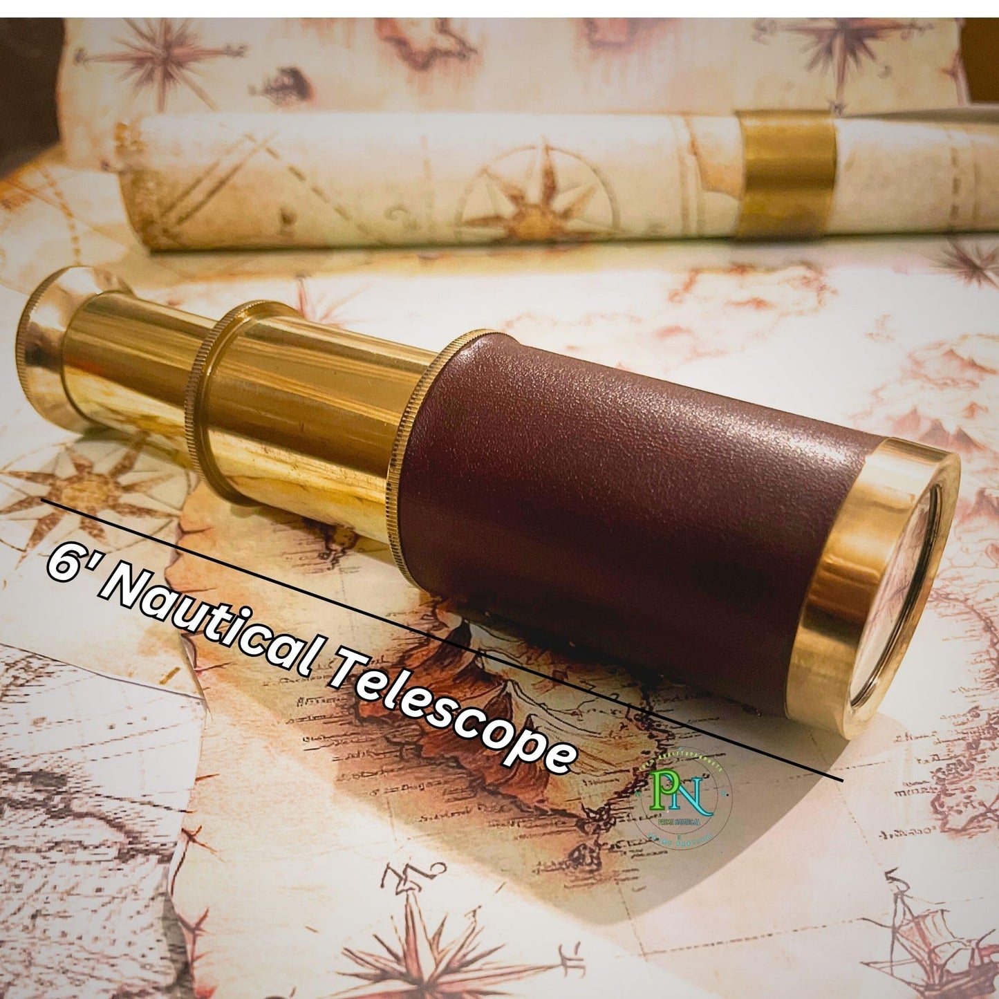 Vintage handheld brass monocular telescope showing leather grip details
