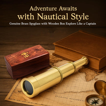 NauticalMart handheld mini spyglass fully extended to six inches on a desk.