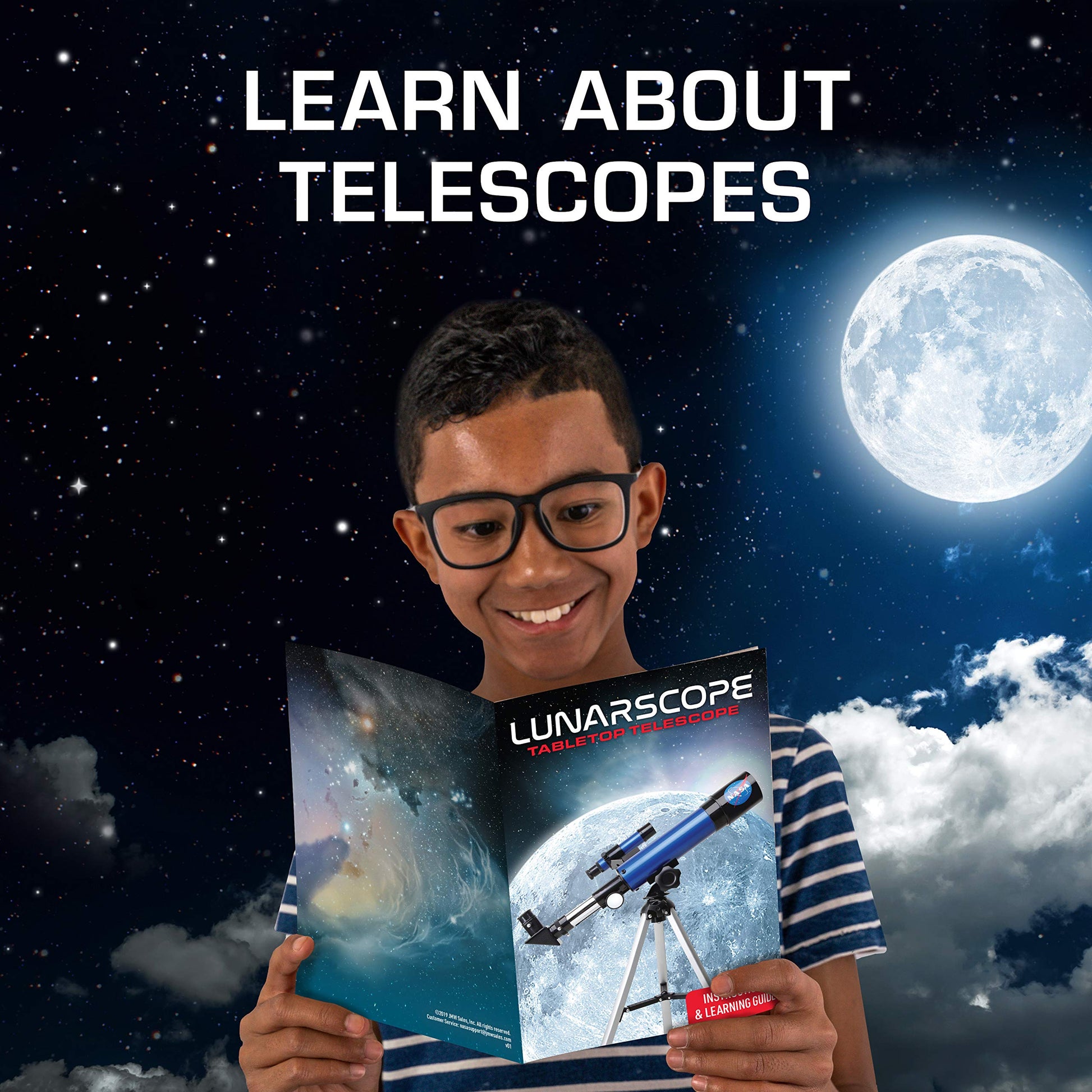Young scientist adjusting the focus knob on the Blue Marble astronomy beginner telescope