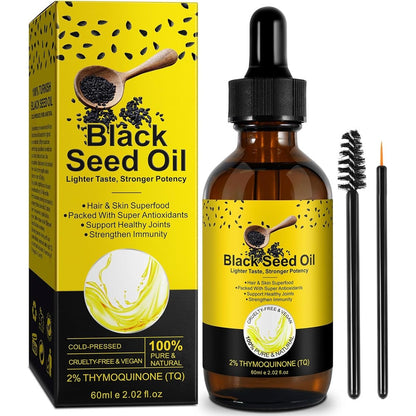 Uocasi Yieegcm organic cold pressed black seed oil bottle front view with yellow label and pipette dropper