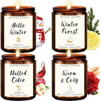 Yinuo Candle 4 Pack Winter Set front view featuring four amber glass jars.