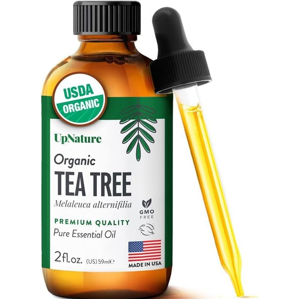 UpNature Organic Tea Tree Oil front view bottle with dropper.
