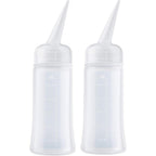 Driew hair applicator bottle front view showing translucent scale markings