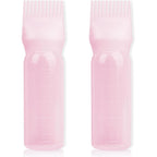BLAAROOM root comb applicator bottle front view showing pink plastic squeeze body and comb cap design.