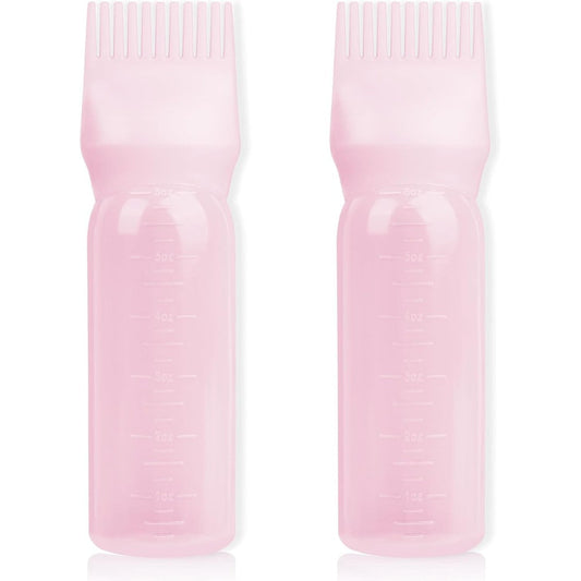 BLAAROOM root comb applicator bottle front view showing pink plastic squeeze body and comb cap design.