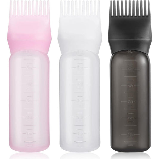 Pimoys root comb applicator bottle front view showing black squeezable plastic and clear measurement scale markings.