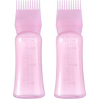 Dymoece root comb applicator bottle pink front view showing graduated scale markings.
