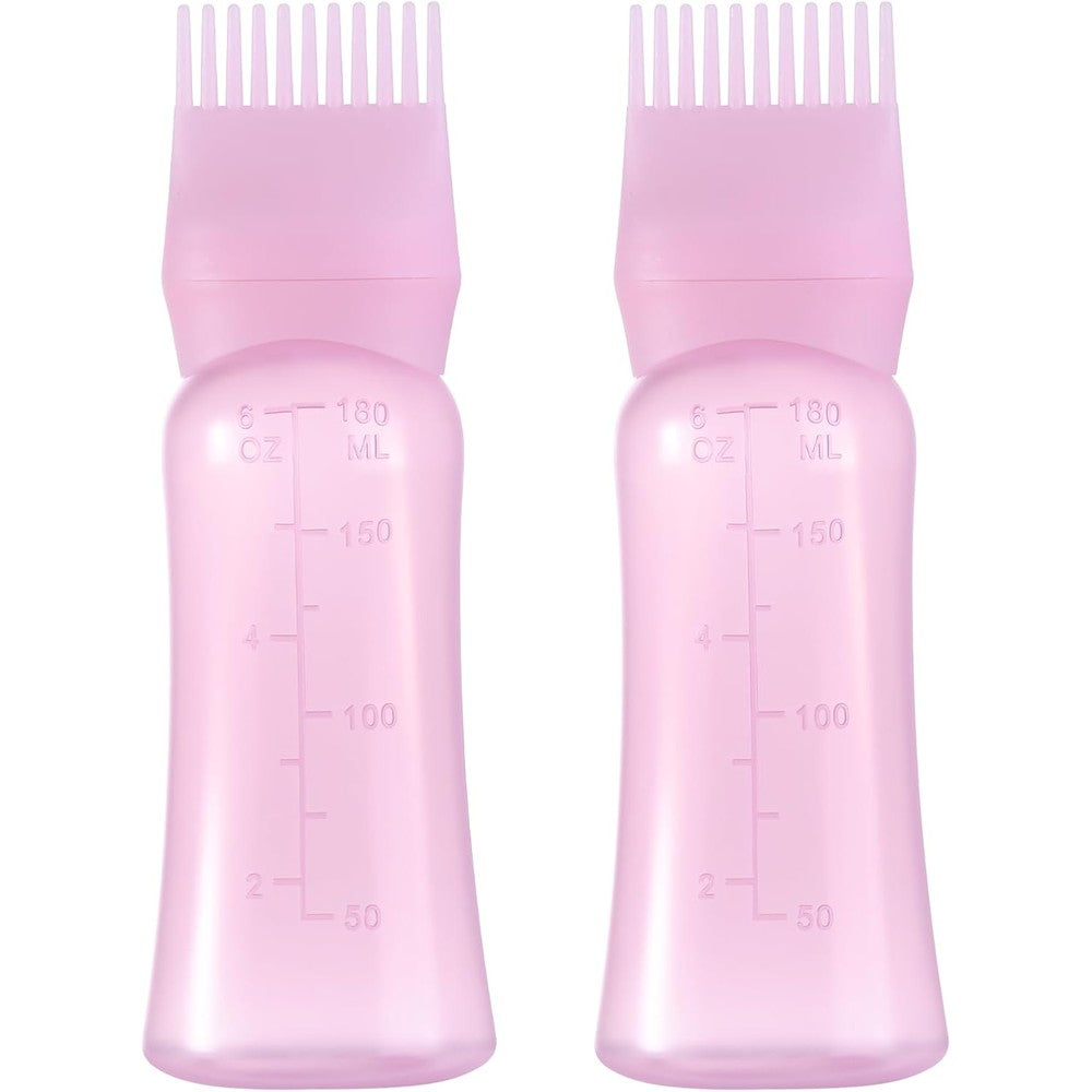 Dymoece root comb applicator bottle pink front view showing graduated scale markings.