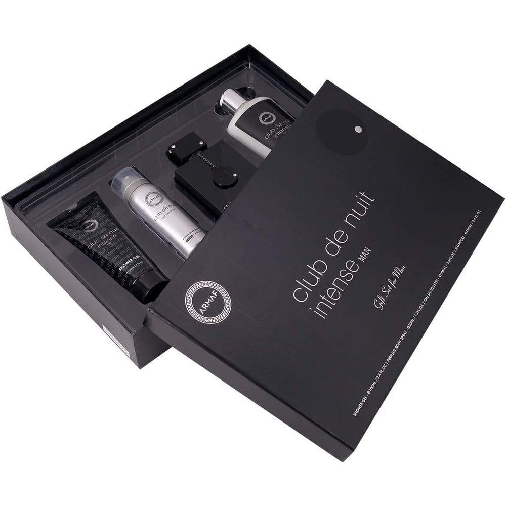 Armaf Club de Nuit Intense for Men 4 Piece Gift Set showing the Eau de Toilette bottle, body spray, shower gel, and shampoo arranged in a premium black display box.