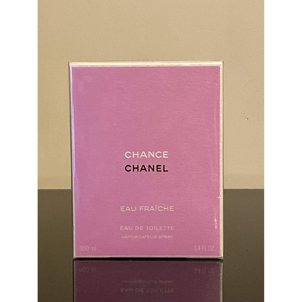 Chanel Chance Eau Fraiche Eau De Toilette 100ml round spray bottle front view showcasing the light green luxury floral perfume.