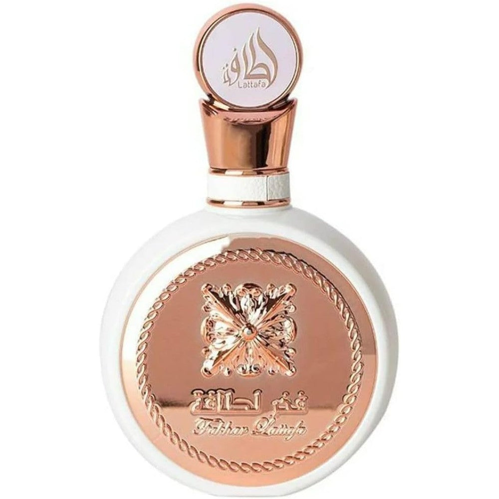 Lattafa Fakhar for Women Eau De Parfum front view of white circular bottle with rose gold accents