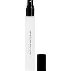 DIME Beauty I Love Your Smell Baby travel perfume front view showing clean packaging.