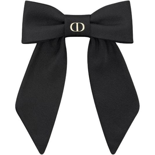 Rudra Retails black bow hair clip front view showcasing premium grosgrain fabric ribbon structure