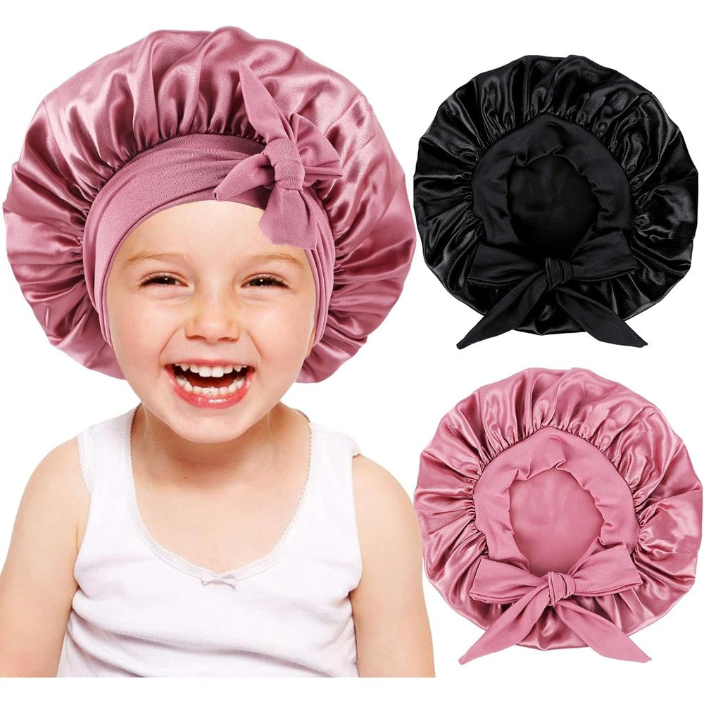 Himoswis kids silk bonnets front view showing black and rose gold satin nightcaps for children