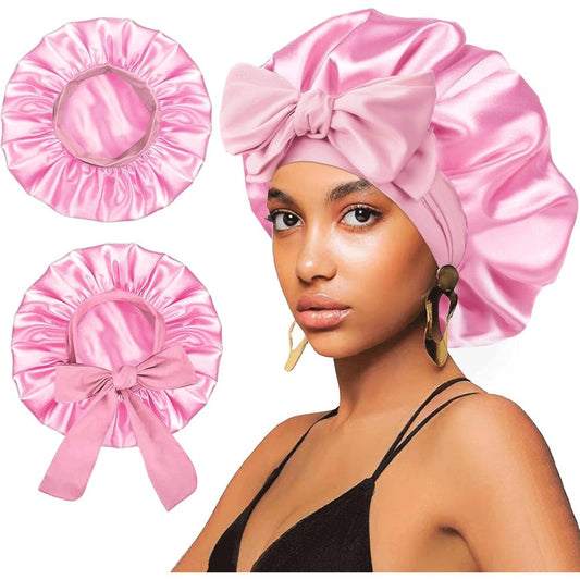 FIRSTPELLA satin silk hair bonnet front view of pink sleeping cap on model
