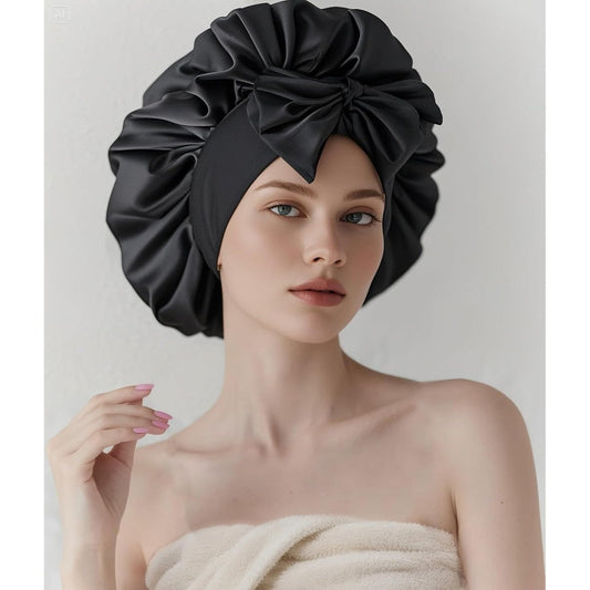 COCOSILK satin hair bonnet front view showing black adjustable wide tie band for curly hair protection.