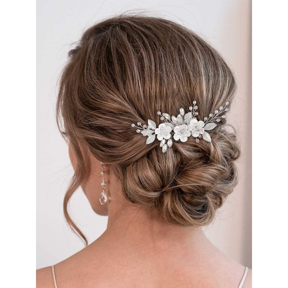 Catery flower bridal hair comb silver front view showcasing crystal detailing.