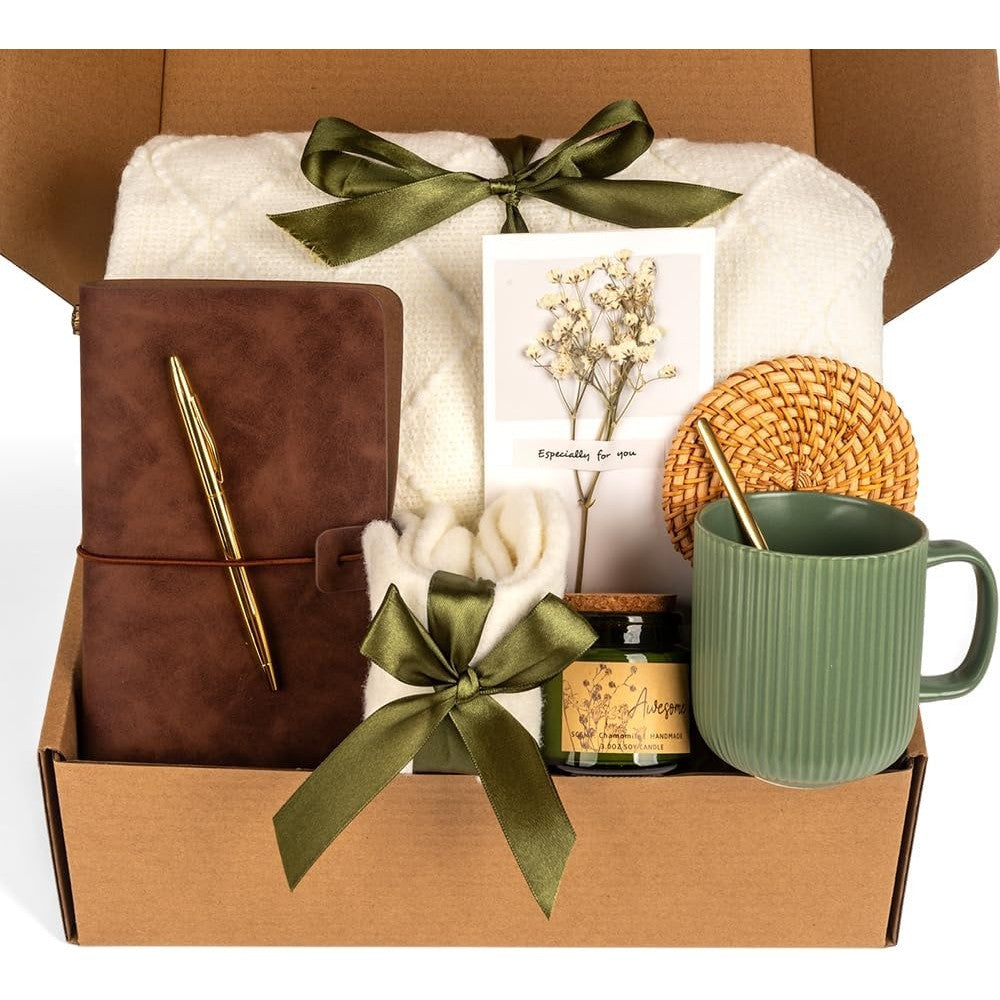 Anforsun self-care gift set featuring a green ceramic mug and blanket