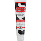 Udderly Smooth Hand Cream front view showing the iconic cow print design and four ounce tube packaging