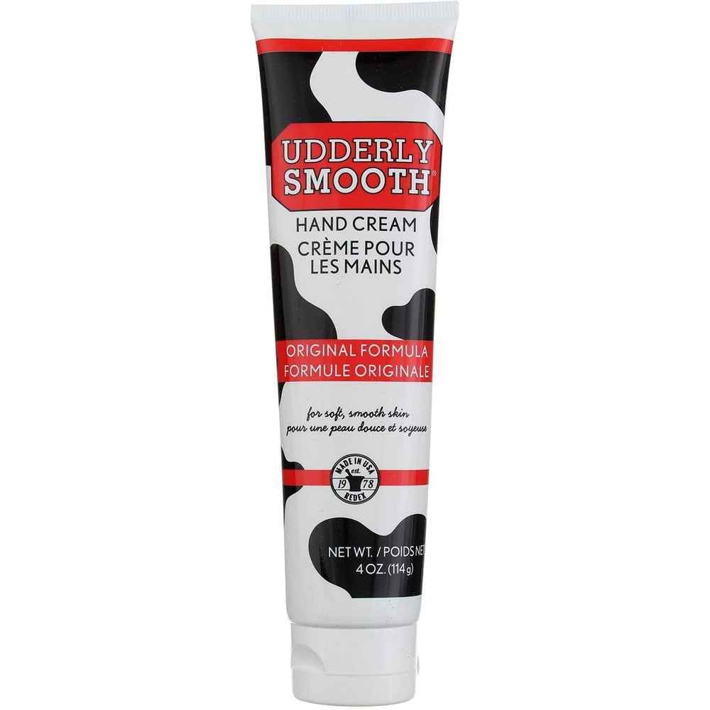 Udderly Smooth Hand Cream front view of the four ounce tube featuring the iconic black and white cow print design