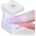 Modelones mini UV LED nail lamp front view showcasing white cat design