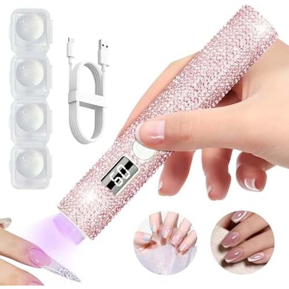 Christine Shelly Handheld UV Light For Gel Nails front view showing the shimmering pink diamond exterior finish.