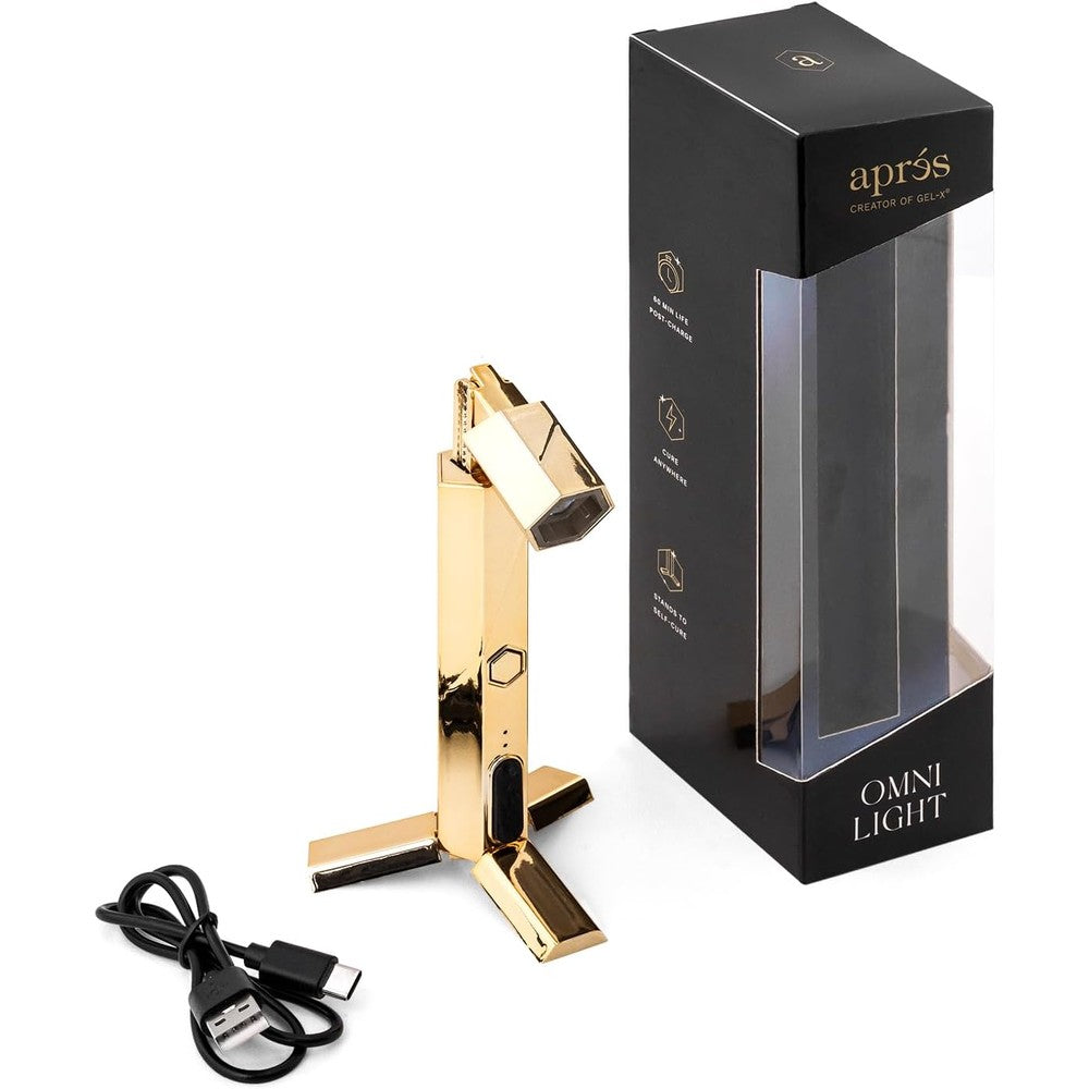 APRÉS Omni Light Gold front view showing the sleek cordless flash curing wand design.