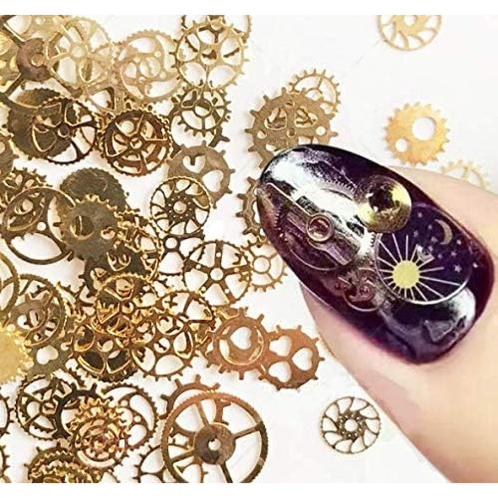 DNHCLL punk time gears nail studs front view of twelve compartment storage wheel containing assorted metallic cogs