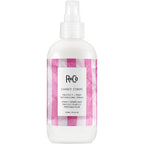 R+Co Candy Stripe Protect and Prep Detangling Spray front view bottle