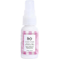 R+Co Candy Stripe Protect and Prep Detangling Spray front view bottle packaging