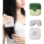 QIYUDA 2-in-1 split end hair trimmer front view showing the white and green dual-sided razor combs