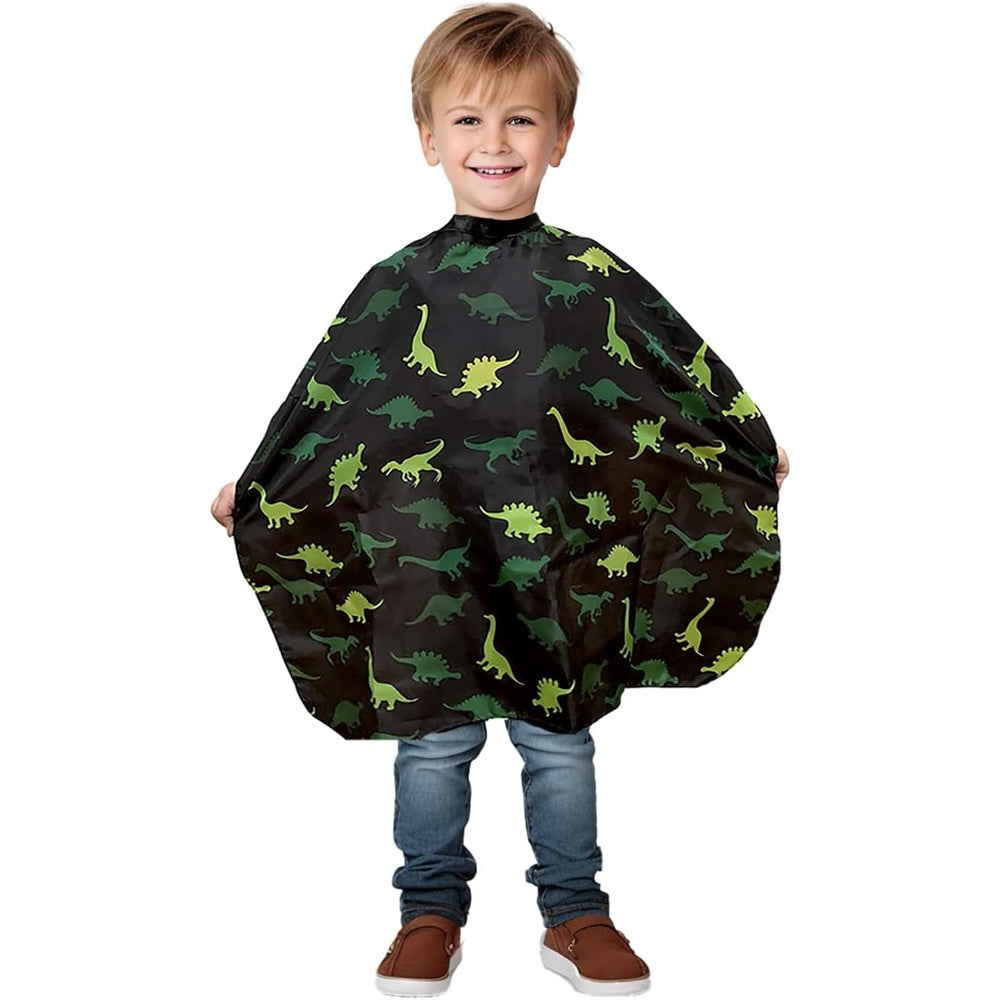 Plum Hill kids barber cape front view featuring a colorful dinosaur print for home haircuts.