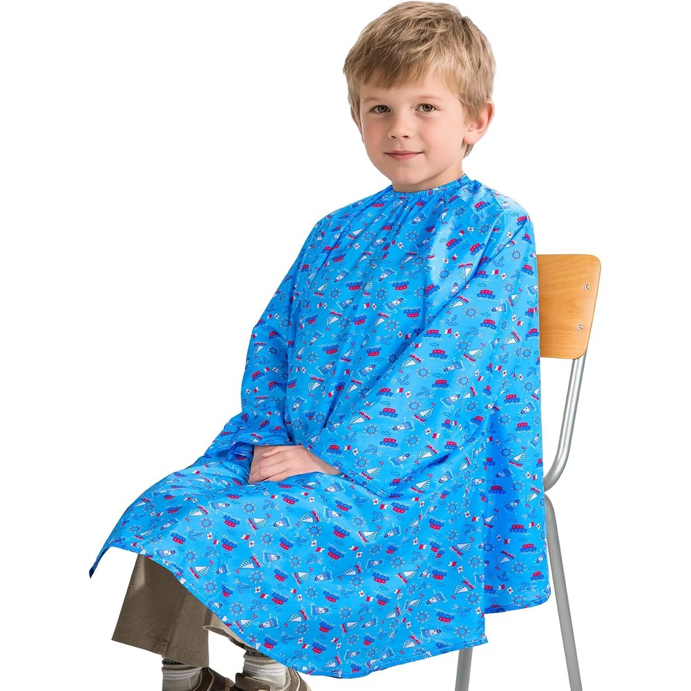 Ancable kids hair cutting cape front view showing blue sailboat print salon apron