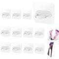 Mollcouver wall mounted shear holders front view showing 12 piece acrylic storage set