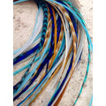 Exotic Feathers Navajo Collection bohemian hair extension kit front view with feathers and application tools.