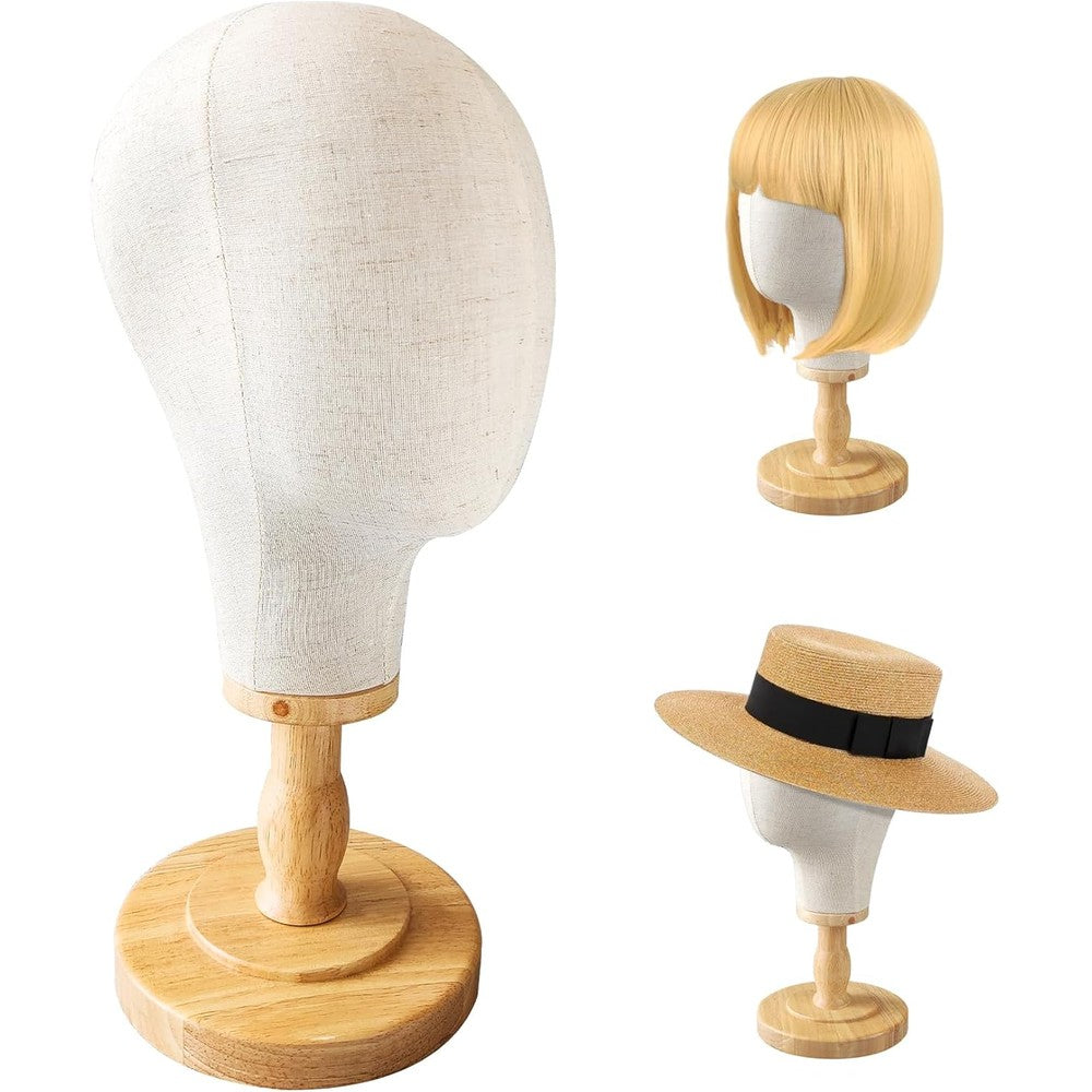 CHADWICK canvas wig head stand front view displaying a natural fabric mannequin dome