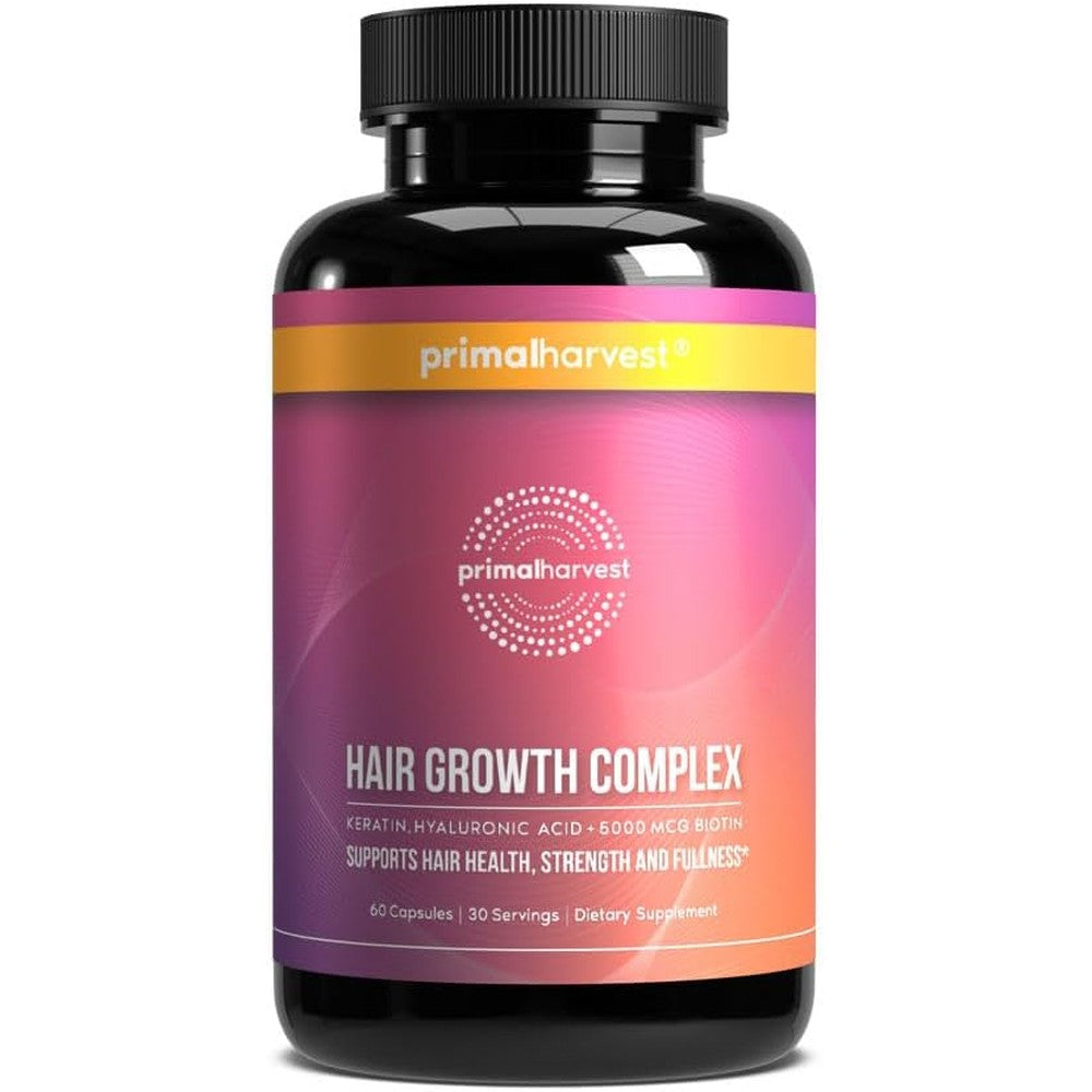 Primal Harvest Hair Growth Complex front view bottle showing pink and orange gradient label.