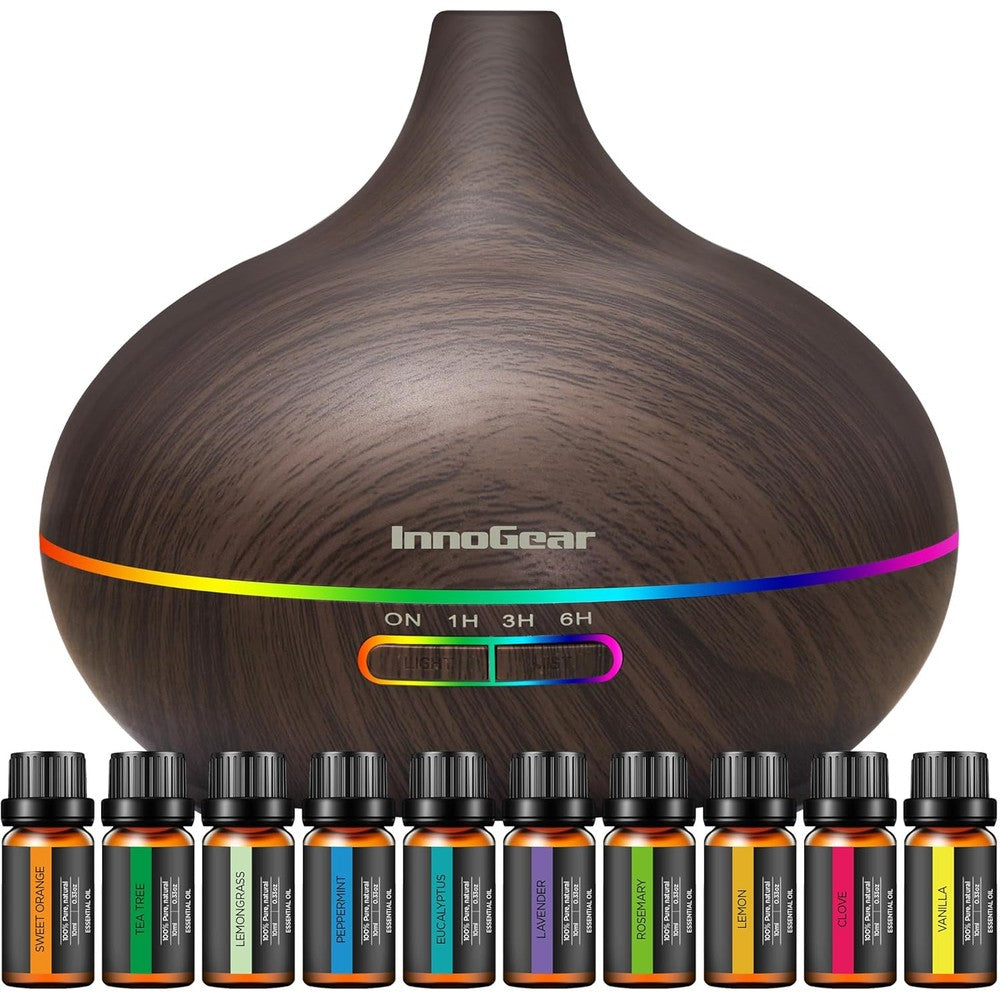 InnoGear Aromatherapy Diffuser front view with dark wood grain finish and mist.
